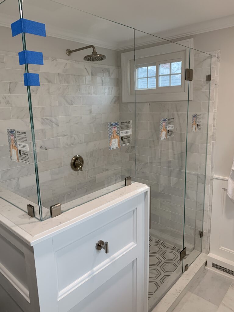 Corner Shower with Centered Mounted Door