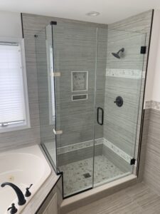 Corner Shower with Dog Leg cutout designed and installed by Harmony Glass NJ