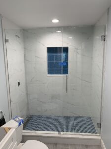 Inline shower with Door and Panel installed by Harmony Glass NJ