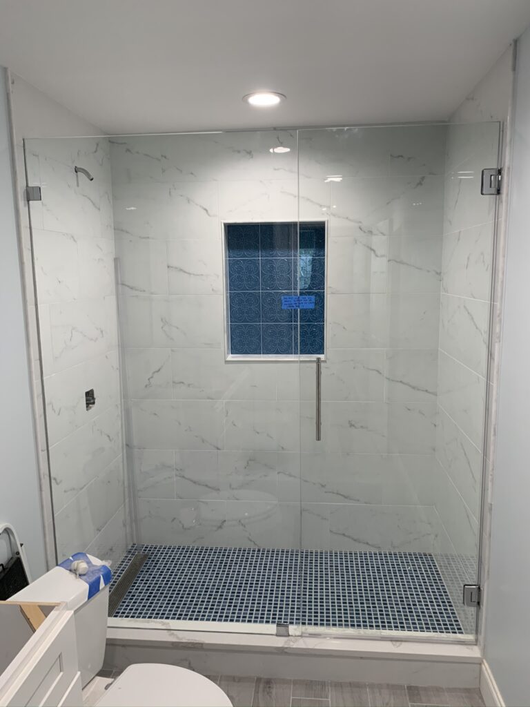 Inline shower with Door and Panel installed by Harmony Glass NJ