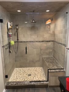 Inline shower with Door and Panel and Seat Cutout INstallation by Harmony Glass NJ