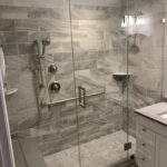 Glass to Glass Inline shower door and panels installed by Harmony Glass
